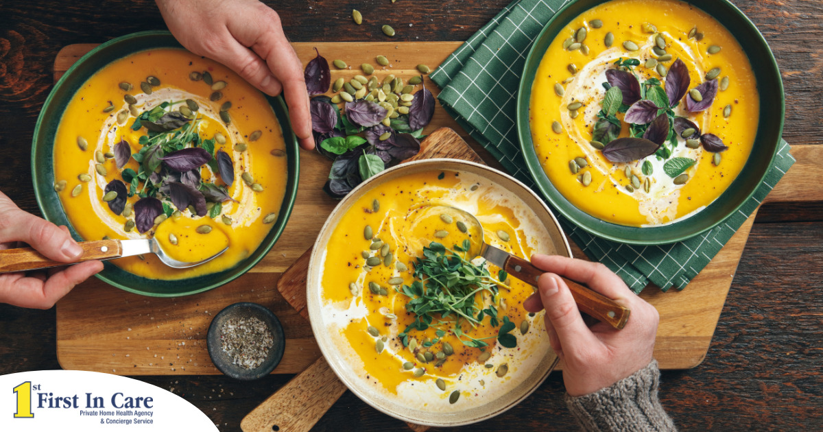 Pumpkin soup like the one in these bowls can be a great choice for a winter food for older adults.