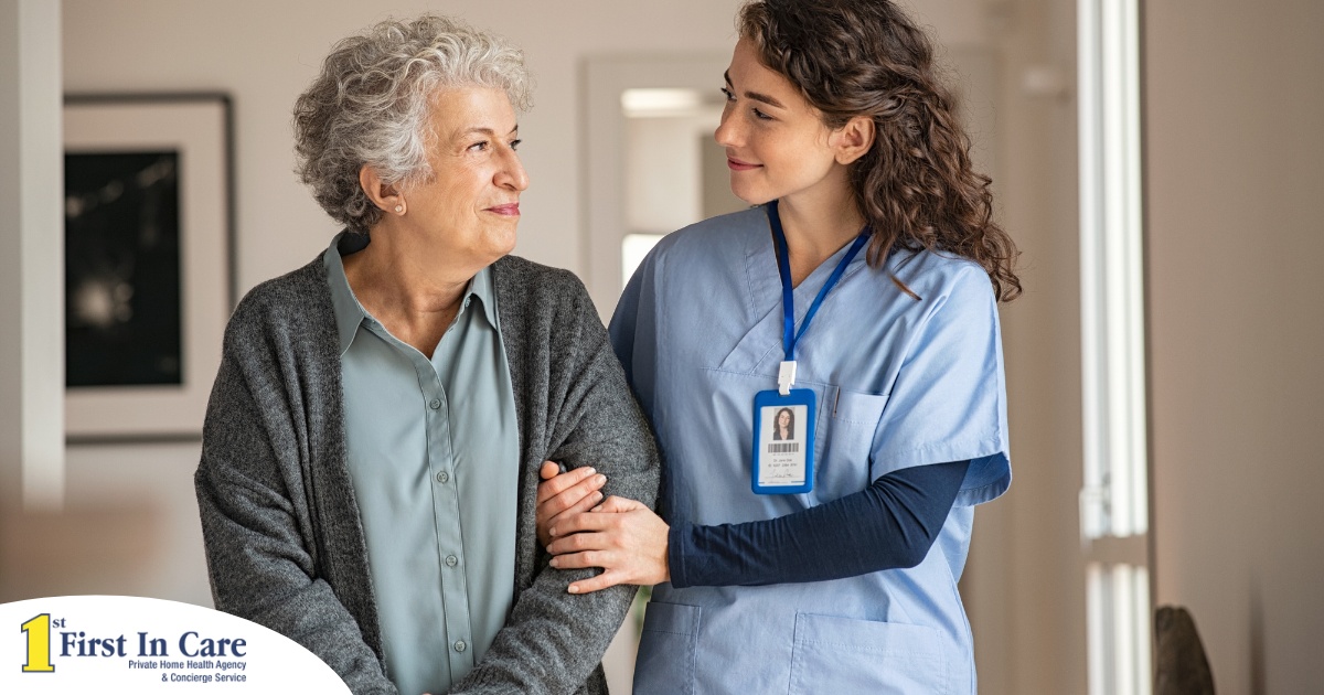 A caregiver and client smile at each other as the caregiver helps the client, representing emotional intelligence in caregiving.