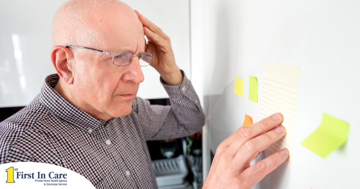 A senior looks at a board confused, representing one of the potential signs of dementia.